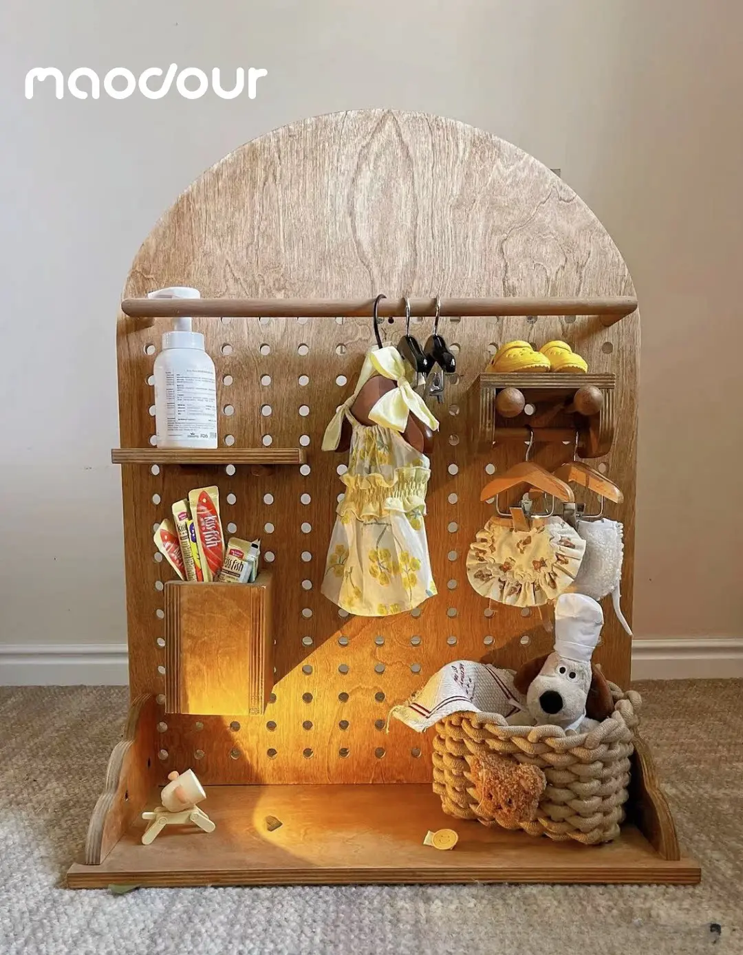 Freestanding dog clothes rack with modular wood accessories